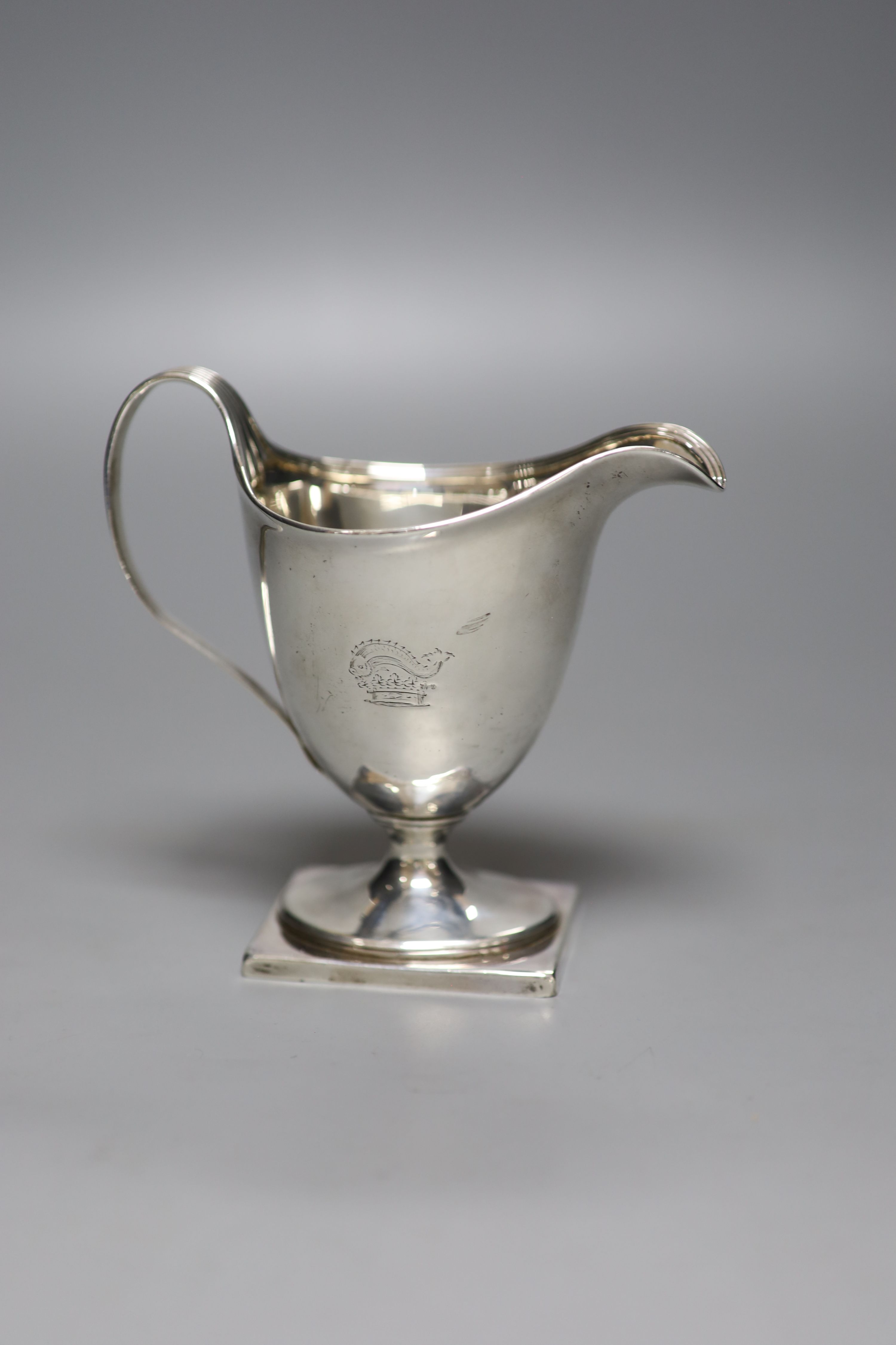 A George III silver helmet shaped pedestal cream jug, Henry Chawner, London, 1795, 13.4cm, 5.5oz